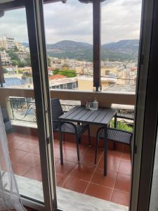 Our Happy Place Maisonette tesisinde bir balkon veya teras