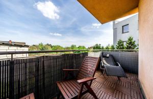 A balcony or terrace at Apartament Belvedere Ławica Airport