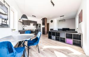 A kitchen or kitchenette at Apartament Belvedere Ławica Airport