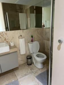 A bathroom at The Franklin Luxury Apartments