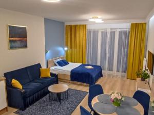 Tempat tidur dalam kamar di Apartament Centrum Białystok