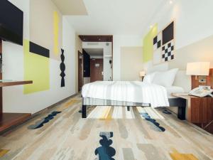 Vuode tai vuoteita majoituspaikassa ibis Styles Warszawa Airport