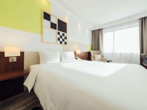 Vuode tai vuoteita majoituspaikassa ibis Styles Warszawa Airport