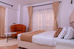 Havan Furnished Apartment-Shawmut tesisinde bir odada yatak veya yataklar