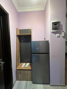 A kitchen or kitchenette at Apartment Merabi