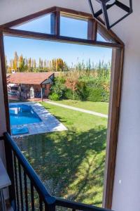 Galerija fotografija objekta Loft con piscina y jardín en los Caminos del Vino u gradu 'Vistalba'