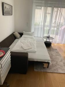 Casa Rumi Munich में एक कमरे में एक या कई बेड