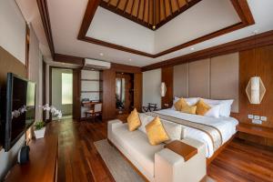 Телевизия и/или развлекателен център в tanadewa Villas Nusa Dua Bali by Cross Collection