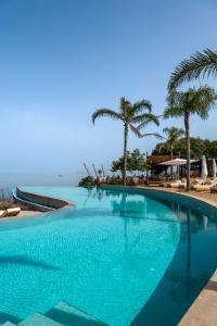 A piscina localizada em Arameras Beach Resort ou nos arredores