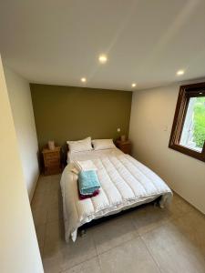 A bed or beds in a room at Appartement in the mountains