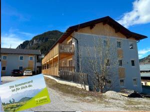 a building with a sign in front of it at Zeffererhof in Schladming