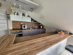 מטבח או מטבחון ב-Velvet loft apartment city centre