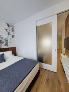 Ліжко або ліжка в номері Jani Studio Apartments