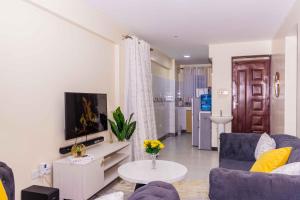 Predel za sedenje v nastanitvi Urban Suites, 2 bedrooms, Nanyuki