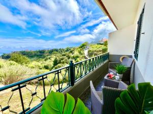 a balcony with a view of the ocean at Villa Garden Santana by Your Key in Santana