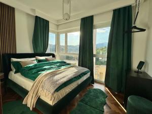 Voodi või voodid majutusasutuse Panorama Suite in Lugano - Pazzallo toas