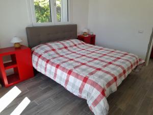 Una cama o camas en una habitación de Appartamenti Luna - Stresa