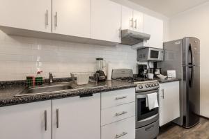 A kitchen or kitchenette at OM 686 URBAN LOFTS Narvarte