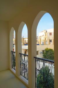 A balcony or terrace at VICTORIA BOUTIQUE HOTEL