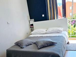 Postelja oz. postelje v sobi nastanitve Apartments Casablanca