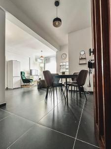 a dining room with a table and chairs at Home Away One Bedroom Apartment in Nicosia in Nicosia