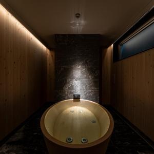 A bathroom at 9HOTEL Tenjin