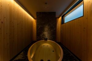 A bathroom at 9HOTEL Tenjin