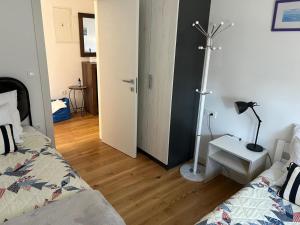 Lova arba lovos apgyvendinimo įstaigoje Apartment Maritimo