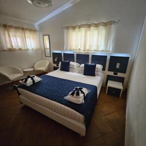 Кровать или кровати в номере Albis Rooms Guest House