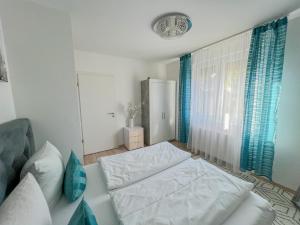 Postel nebo postele na pokoji v ubytování Relax Prémium Wellness Apartman