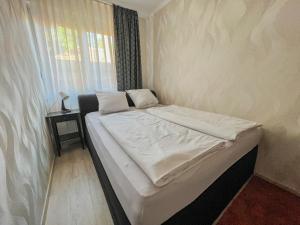 Postel nebo postele na pokoji v ubytování Relax Prémium Wellness Apartman