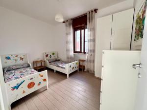 Krevet ili kreveti u jedinici u objektu Donizetti Vacation Apartment