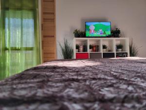 A television and/or entertainment centre at Casa BranKat