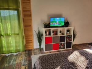 A television and/or entertainment centre at Casa BranKat