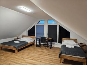 Cama ou camas em um quarto em Gasthaus Pinneberg