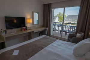 Lova arba lovos apgyvendinimo įstaigoje Best Western Plus Le Roof Vannes Bord de Mer