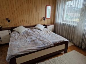 Кровать или кровати в номере GreenFamilyAppartment near Ljubljana