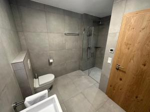 Un baño de Exklusives Chalet-Haus mit Gletscherblick