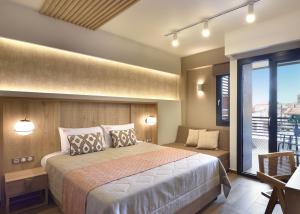 Cama ou camas em um quarto em CORYLUS Luxury Rooms & Suites