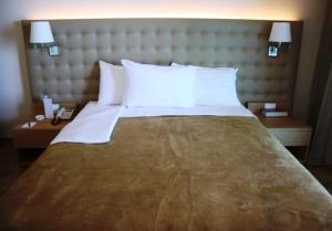 Cama ou camas em um quarto em Boutique Hotel