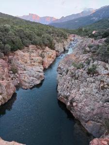 an aerial view of a river between rocks at Casa Solana - Piscine privée et chauffée in Galeria