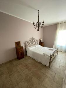 A bed or beds in a room at Agriturismo Tenuta Filippi