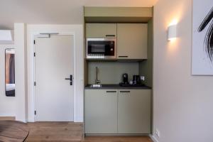 A kitchen or kitchenette at BB aan de kapel