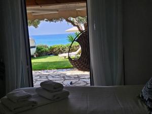 Camera con letto e vista sull'oceano. di Corfu Glyfada Beach Apartment 13 a Glifada (Glyfada)