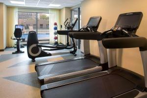 a gym with treadmills and ellipticals in a room at Hyatt Place Washington DC/US Capitol in Washington