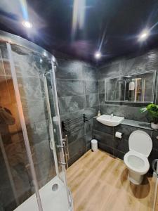 A bathroom at Luxury modern 1 bedroom house