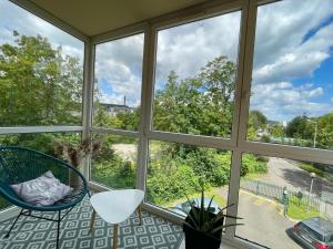 En balkong eller terrasse på Appartement avec Loggia et Parking privé