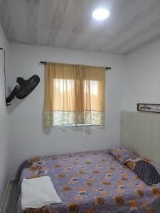 เตียงในห้องที่ Hostal Altamar De La Guajira