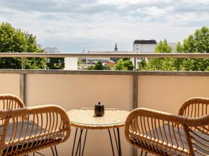 Un balcón o terraza en Design-Apartment in der Welser Innenstadt mit NETFLIX & Balkon