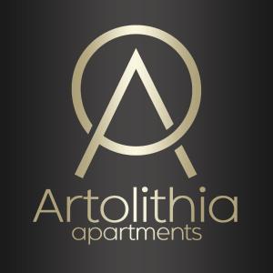 Ett certifikat, pris eller annat dokument som visas upp på Artolithia Apartments